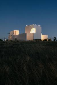 Exterior night view of Casa Cabrita Moleiro