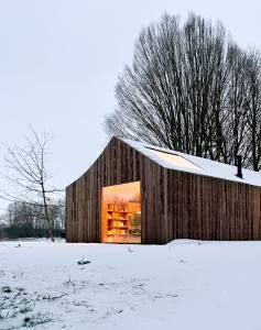 Exterior facade of Shady Shed with snow